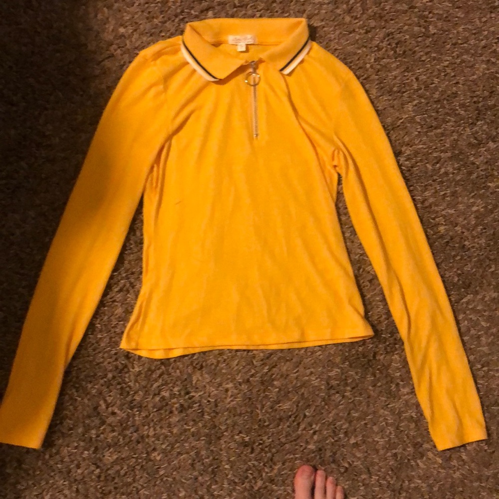 A long sleeved yellow shirt